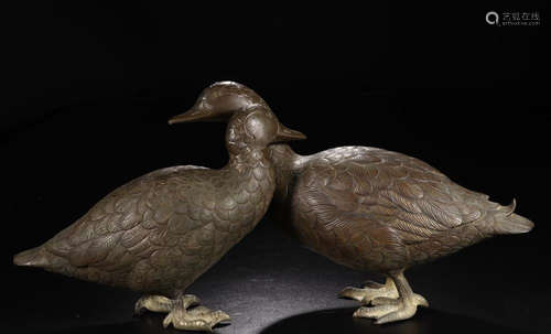 A PAIR OF DUCK SHAPED ORNAMENTS