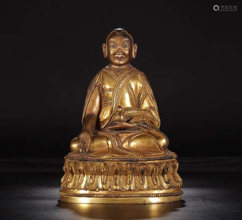 A GILT BRONZE BUDDHA