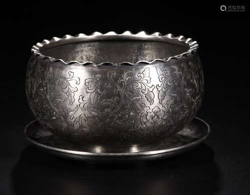 A FLOWER PATTERN CAREVD SILVER BOWL