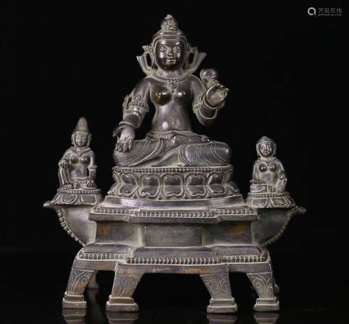 A BRONZE TARA ORNAMENT