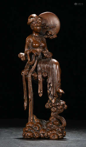 A HUANGYANG  FIGURE WOOD LADY AND THE MOON ORNAMENT