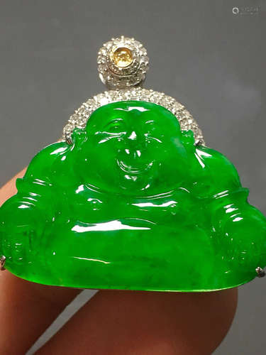 A GREEN JADEITE CARVED 