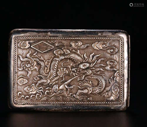 A SILVER DRAGON CARVED CIGARETT BOX