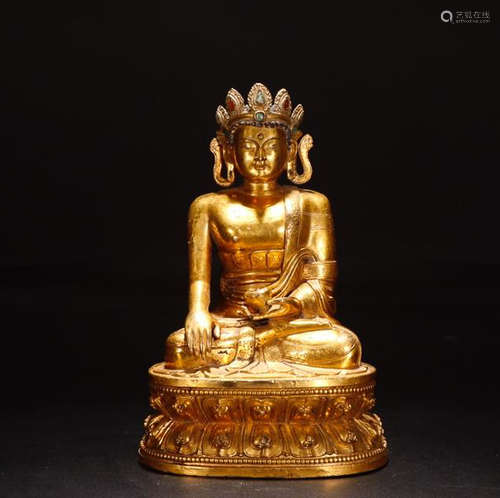 A GILT BRONZE SIT ON A LOTU GUATAMA BUDDHA