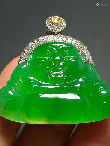 A GREEN JADEITE CARVED 