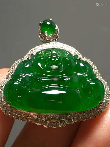 A GREEN JADEITE CARVED 