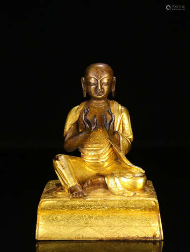 A GILT BRONZE BUDDHA