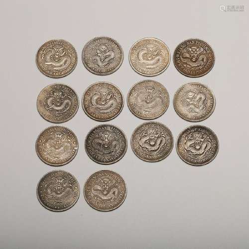 CHINESE SET OF 14 SILVER COINS