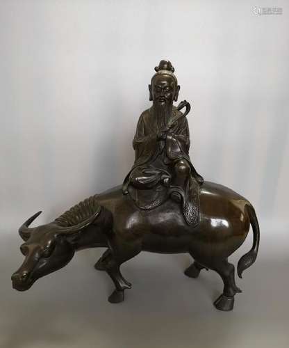 CHINESE BRONZE FIGURE OF MAN ON BUFFALO