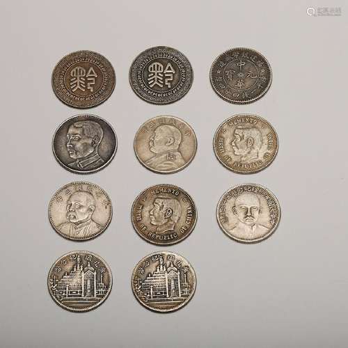 CHINESE SET OF 11 SILVER COINS