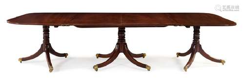 *A George III Mahogany Triple-Pedestal Dining Table