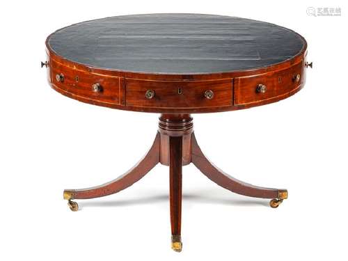 A George III Mahogany Rent Table with a leather-inset