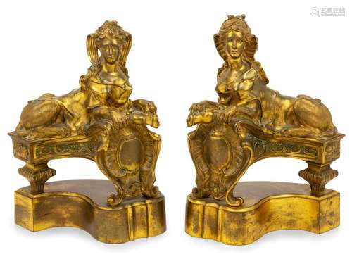 *A Pair of Gilt Bronze Figural Chenets