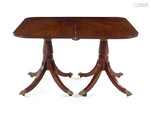 *A George III Mahogany Double Pedestal Dining Table