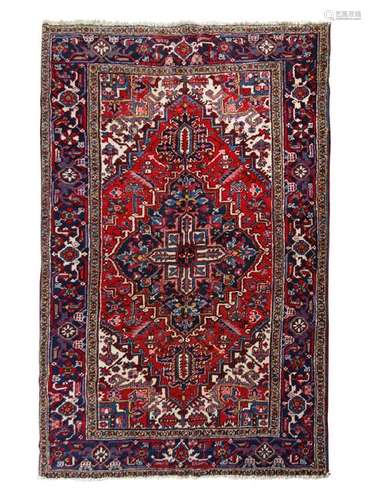 A Heriz Wool Rug 20th Century 9 feet x 6 feet.Â