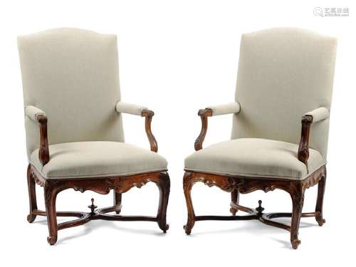 A Pair of Louis XV Carved Walnut Fauteuils