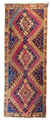 A Kilim Wool Rug Circa 1880s 12 feet 11 inches x 5 feet