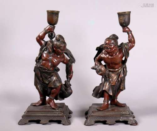 Pair Meiji Japanese Bronze Guardian Candle Sticks