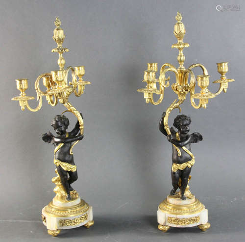 Pair of 19th century Louis XVI style parcel gilt bronze five light candelabra with acanthus