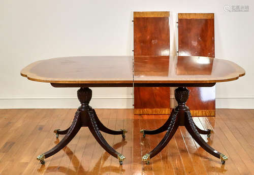 Mahogany double-pedestal dining table with acanthus leaf carving, two leaves, 29 1/2