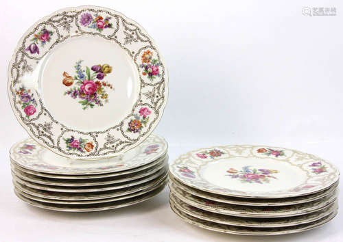 Set of fourteen (14) floral-decorated porcelain plates, 11