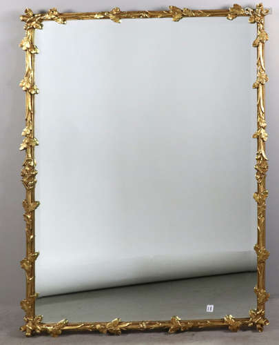 French beveled glass mirror in giltwood frame, carved twig and leaf design, 56