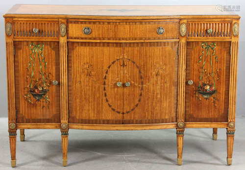 Adam-style floral painted and marquetry inlaid satinwood cabinet, three drawers over four doors,