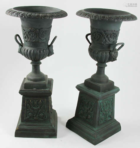 Pair of Victorian-style cast iron garden urns on pedestals, 42