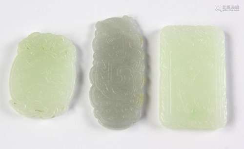 Three Chinese Carved Hardstone Pendants