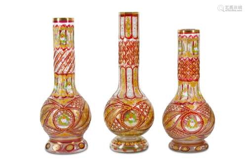 THREE RED BOHEMIA GLASS HUQQA BASES FOR THE IRANIAN