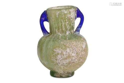 A ROMAN GREEN GLASS MOULD-BLOWN FLASK