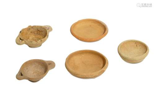 A GROUP OF FIVE MINIATURE TERRACOTTA VOTIVE VESSELS