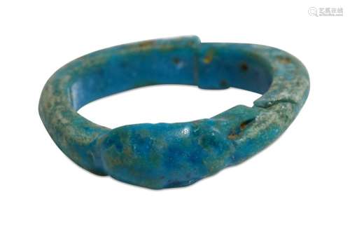 AN EGYPTIAN GLAZED COMPOSITION RING