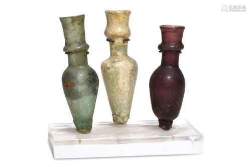THREE ROMAN GLASS UNGUENTARIA