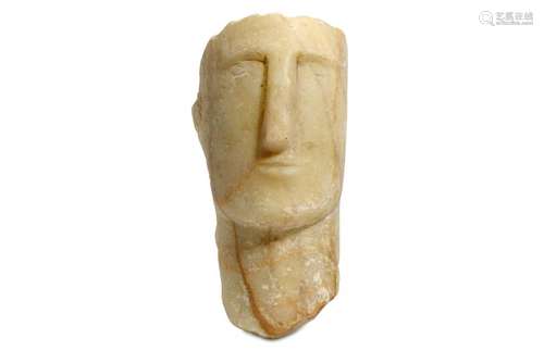 A SOUTH ARABIAN ALABASTER HEAD Circa 1st Century B.C. -