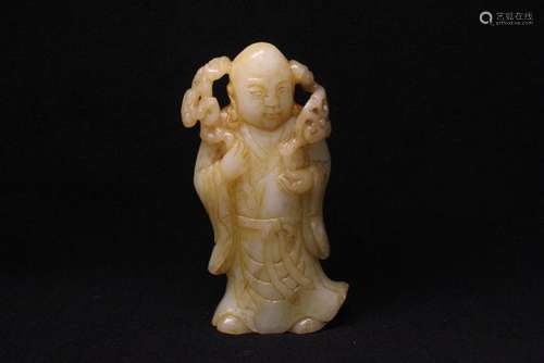 White jade carved monk