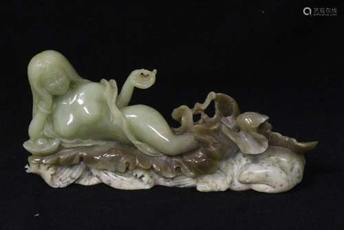 A green jade carving depicting nude girl