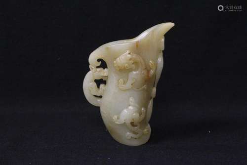 A fine Chinese white jade carved libation cup