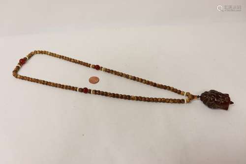 Chinese amber like pendant w/ a bead necklace