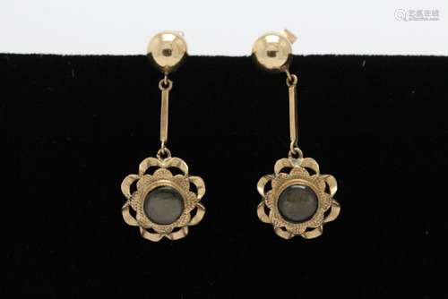 Pair 14K Y/G black star sapphire earrings