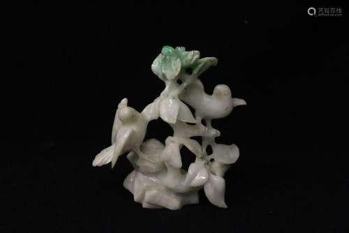 A jadeite carving depicting bird and flowers