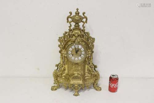 A very fancy brass table clock