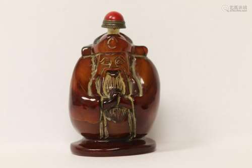 Chinese horn carved snuff bottle in figure motif