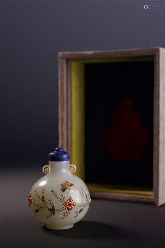 A Chinese White Jade Snuff Bottle Embellished with Treasures