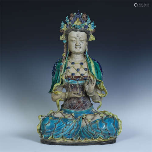 A Chinese Carved Sancai Porcelain Figure of Guanyin, Yuan Dynasty