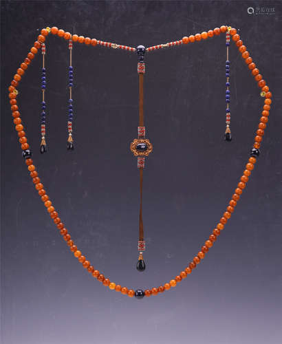 A Chinese Carved Amber Court Necklace