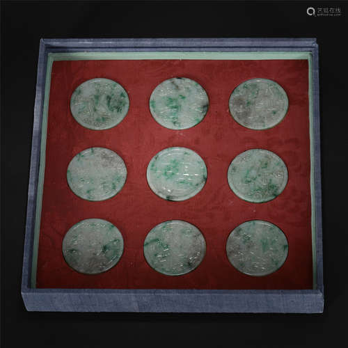 A Set of Eight Chinese Carved  Jadeite Belt Plaques