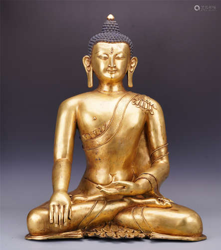 A Chinese Gilt Bronze Figure of Seated Sakyamuni Buddha