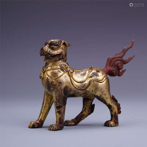 A Chinese Carved Gilt Bronze Mythical Beast