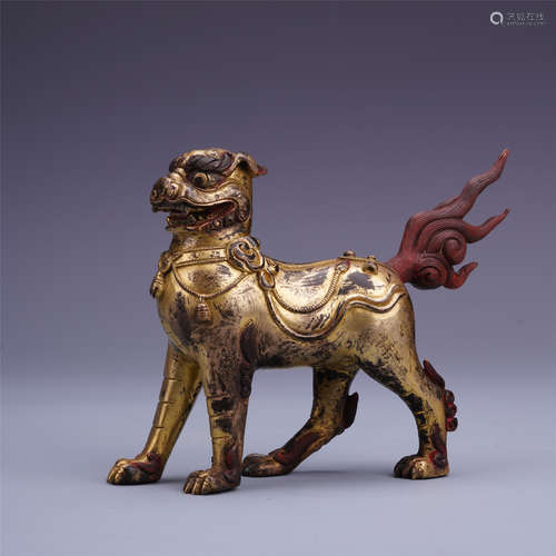 A Chinese Carved Gilt Bronze Mythical Beast